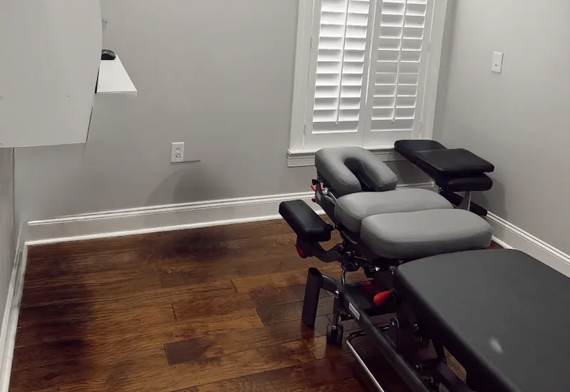 Comfortable chiropractic table at MS Upper Cervical Clinic.